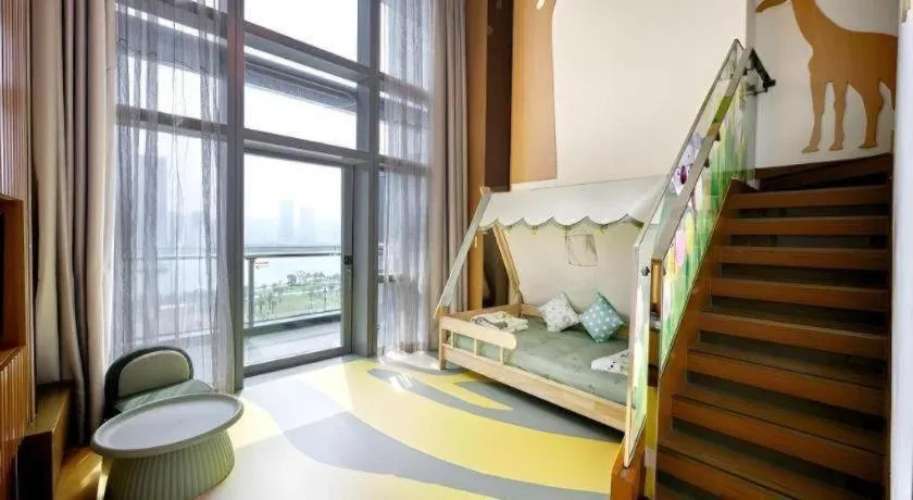 Bed in Huafa Executive Apartment Hotel Zhuhai