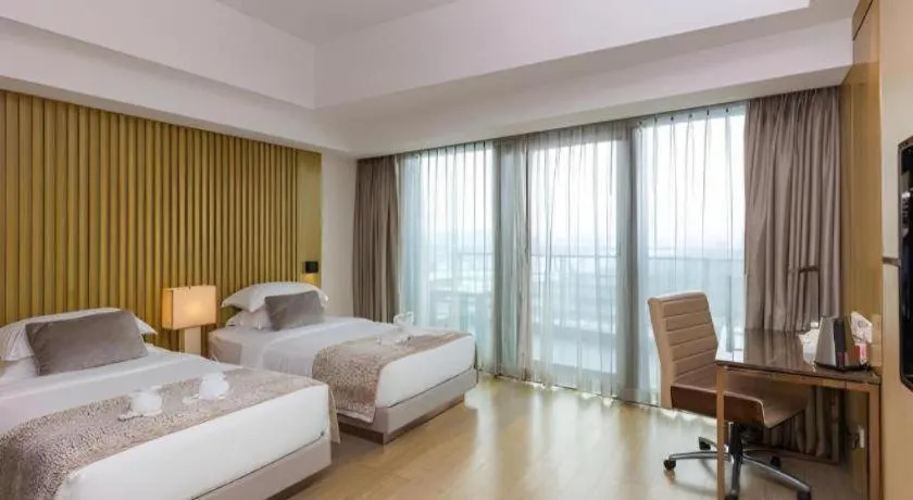Bed in Huafa Executive Apartment Hotel Zhuhai