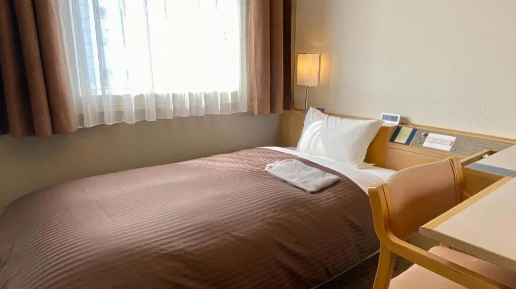 Bed in Hotel Castle Plaza