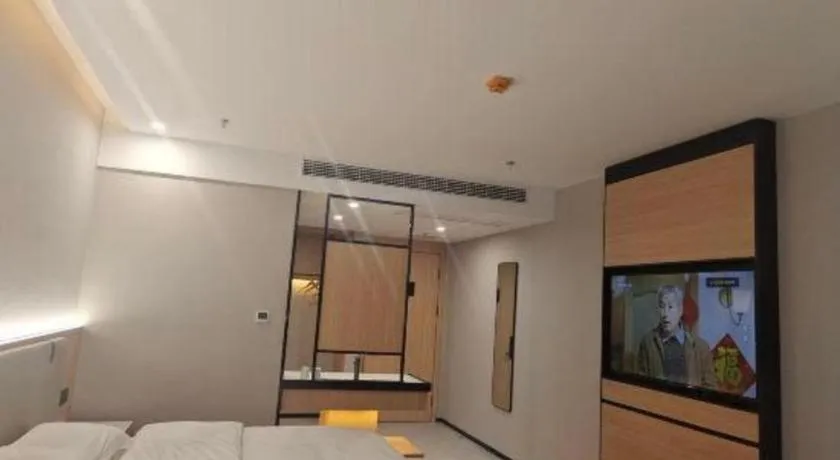 Bed in GreenTree Inn Shanghai Songjiang WanDa Plaza RonGMEi Road Express Hotel