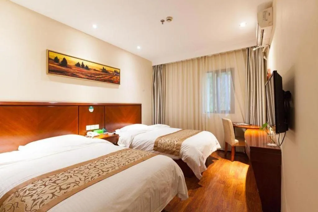 Bed in GreenTree Inn Shanghai Songjiang WanDa Plaza RonGMEi Road Express Hotel