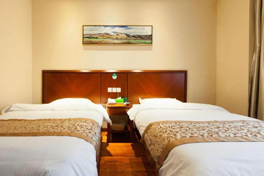 Bed in GreenTree Inn Shanghai Songjiang WanDa Plaza RonGMEi Road Express Hotel