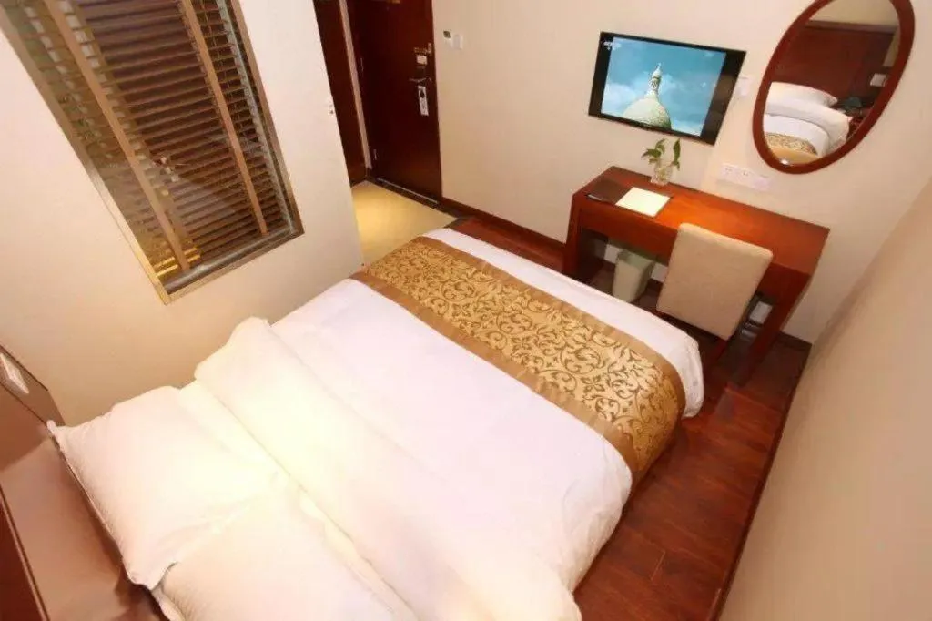 Bed in GreenTree Inn Shanghai Songjiang WanDa Plaza RonGMEi Road Express Hotel