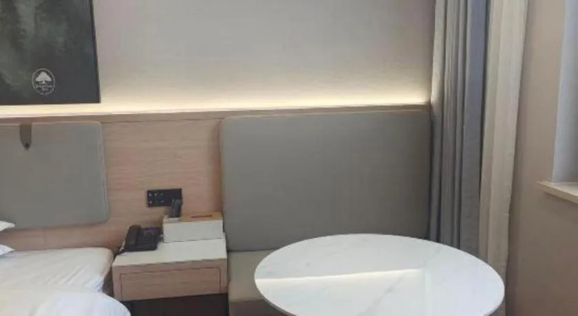 Bed in GreenTree Inn Shanghai Songjiang WanDa Plaza RonGMEi Road Express Hotel