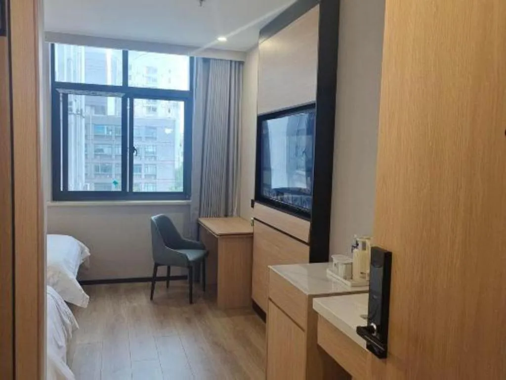 Bed in GreenTree Inn Shanghai Songjiang WanDa Plaza RonGMEi Road Express Hotel