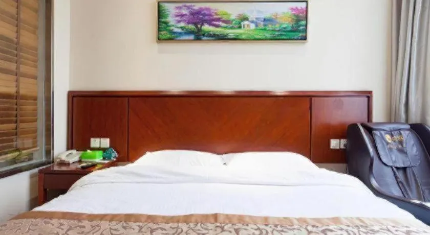 Bed in GreenTree Inn Shanghai Songjiang WanDa Plaza RonGMEi Road Express Hotel
