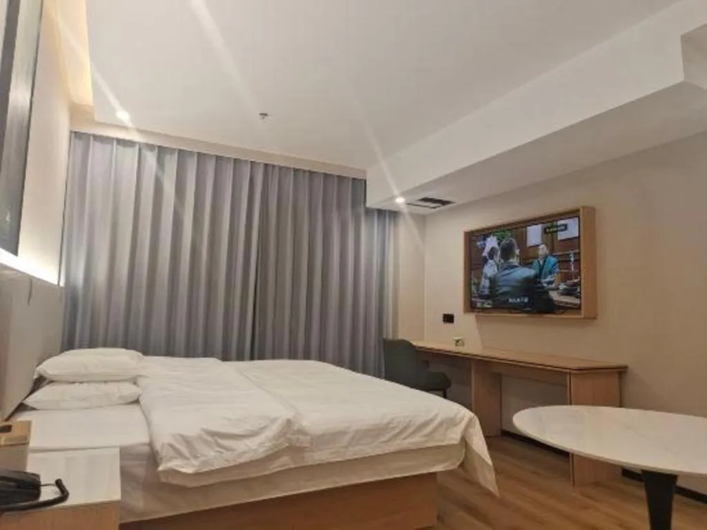 Bed in GreenTree Inn Shanghai Songjiang WanDa Plaza RonGMEi Road Express Hotel