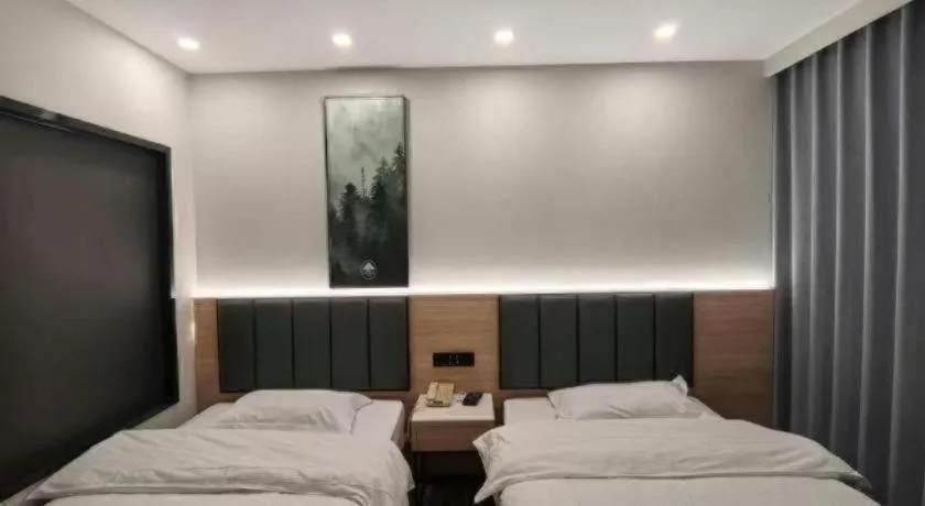 Bed in GreenTree Inn Shanghai Songjiang WanDa Plaza RonGMEi Road Express Hotel