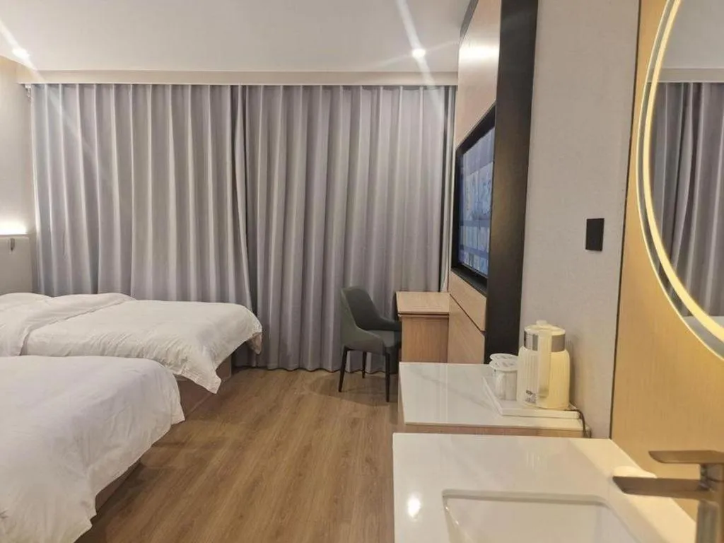 Bed in GreenTree Inn Shanghai Songjiang WanDa Plaza RonGMEi Road Express Hotel