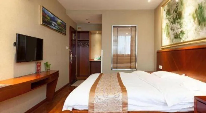 Bed in GreenTree Inn Shanghai Songjiang WanDa Plaza RonGMEi Road Express Hotel