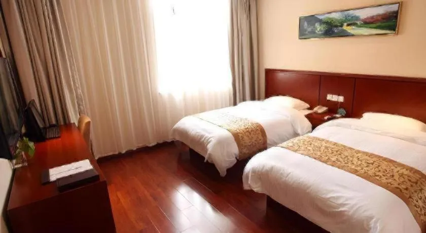 Bed in GreenTree Inn Shanghai Songjiang WanDa Plaza RonGMEi Road Express Hotel