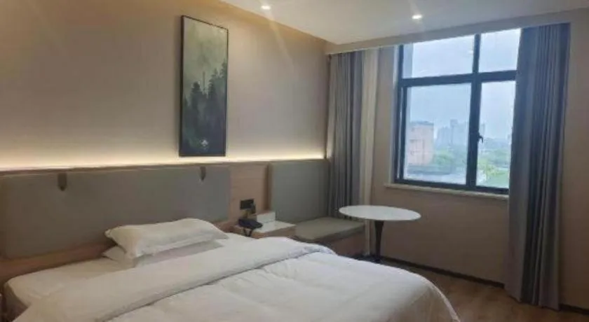 Bed in GreenTree Inn Shanghai Songjiang WanDa Plaza RonGMEi Road Express Hotel