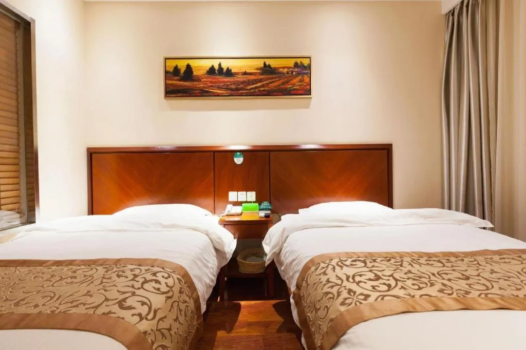 Bed in GreenTree Inn Shanghai Songjiang WanDa Plaza RonGMEi Road Express Hotel