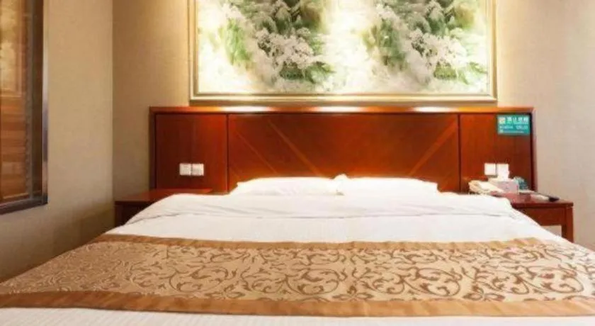 Bed in GreenTree Inn Shanghai Songjiang WanDa Plaza RonGMEi Road Express Hotel