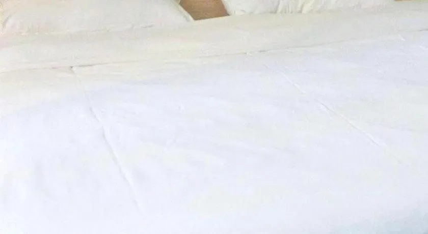 Bed in GreenTree Inn Shanghai Songjiang WanDa Plaza RonGMEi Road Express Hotel