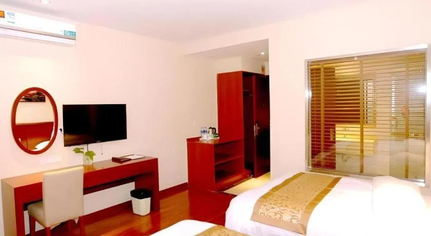 Bed in GreenTree Inn Shanghai Songjiang WanDa Plaza RonGMEi Road Express Hotel