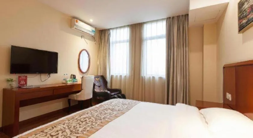 Bed in GreenTree Inn Shanghai Songjiang WanDa Plaza RonGMEi Road Express Hotel