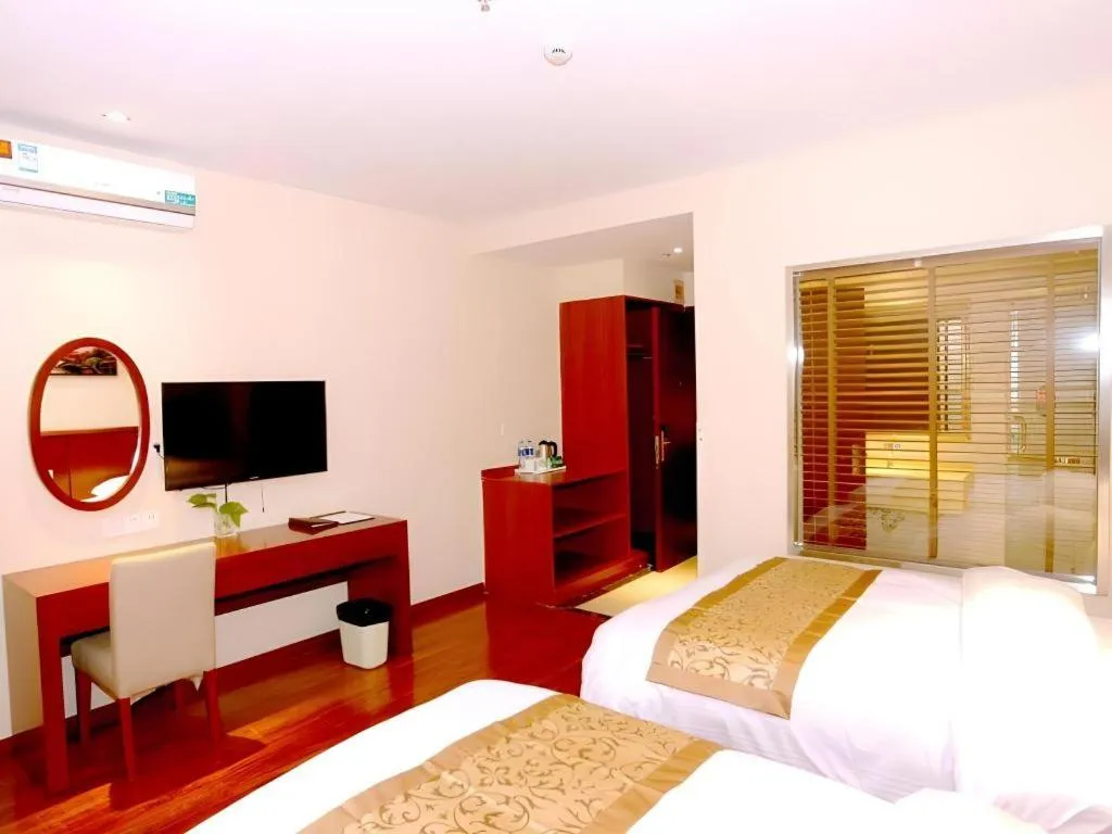 Bed in GreenTree Inn Shanghai Songjiang WanDa Plaza RonGMEi Road Express Hotel