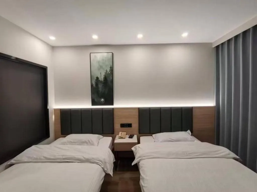Bed in GreenTree Inn Shanghai Songjiang WanDa Plaza RonGMEi Road Express Hotel