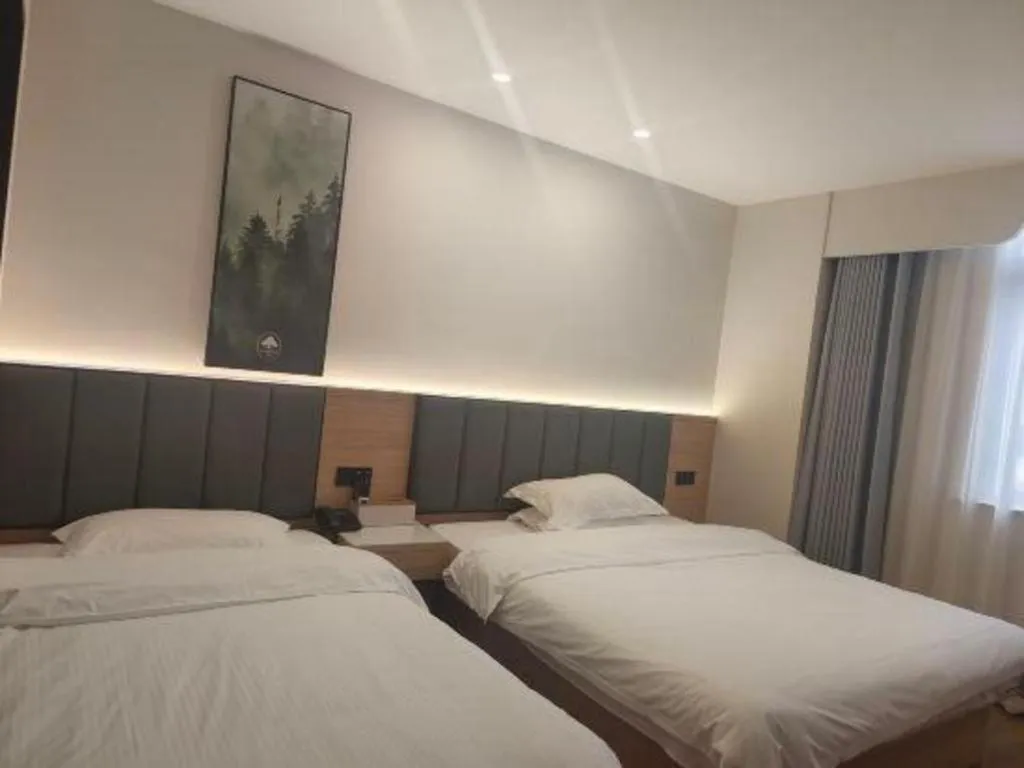 Bed in GreenTree Inn Shanghai Songjiang WanDa Plaza RonGMEi Road Express Hotel