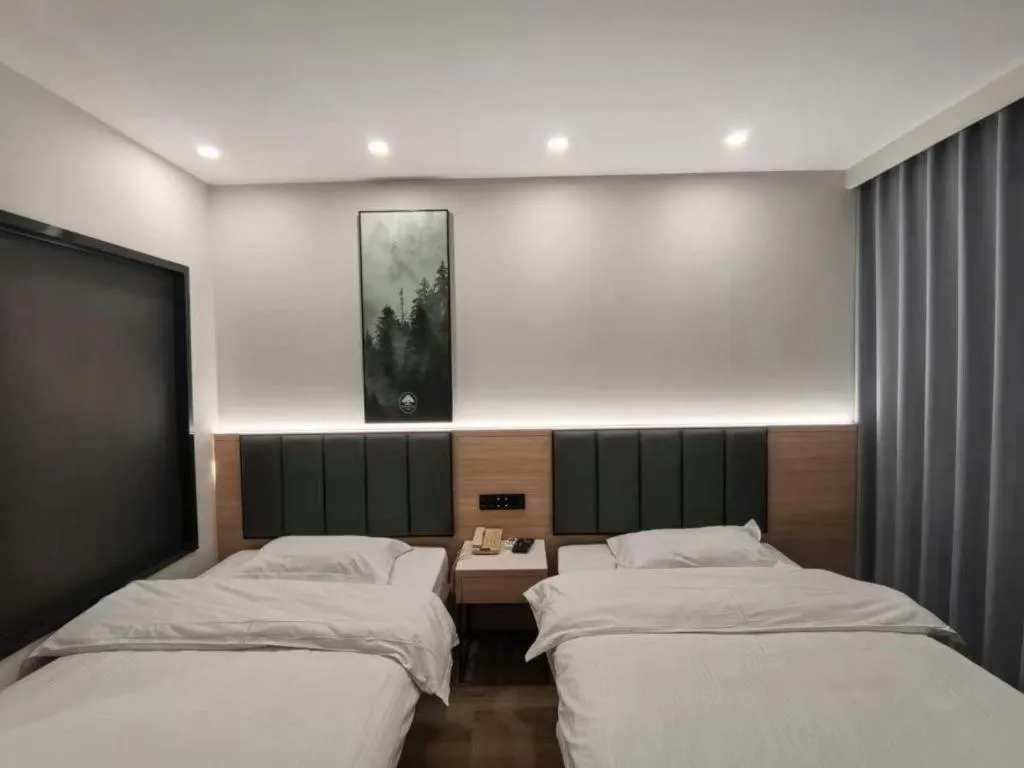 Bed in GreenTree Inn Shanghai Songjiang WanDa Plaza RonGMEi Road Express Hotel