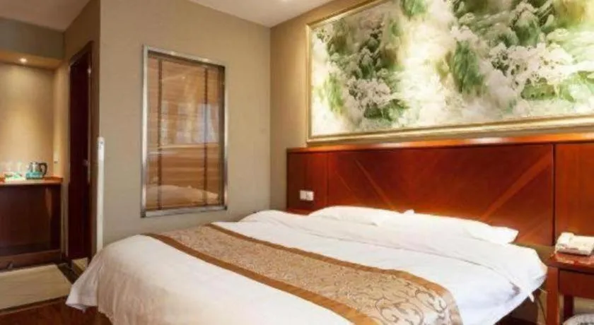Bed in GreenTree Inn Shanghai Songjiang WanDa Plaza RonGMEi Road Express Hotel