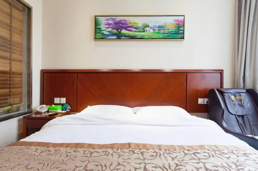Bed in GreenTree Inn Shanghai Songjiang WanDa Plaza RonGMEi Road Express Hotel