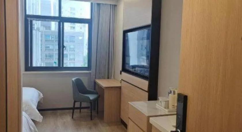 Bed in GreenTree Inn Shanghai Songjiang WanDa Plaza RonGMEi Road Express Hotel