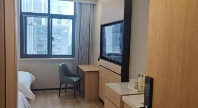 Bed in GreenTree Inn Shanghai Songjiang WanDa Plaza RonGMEi Road Express Hotel