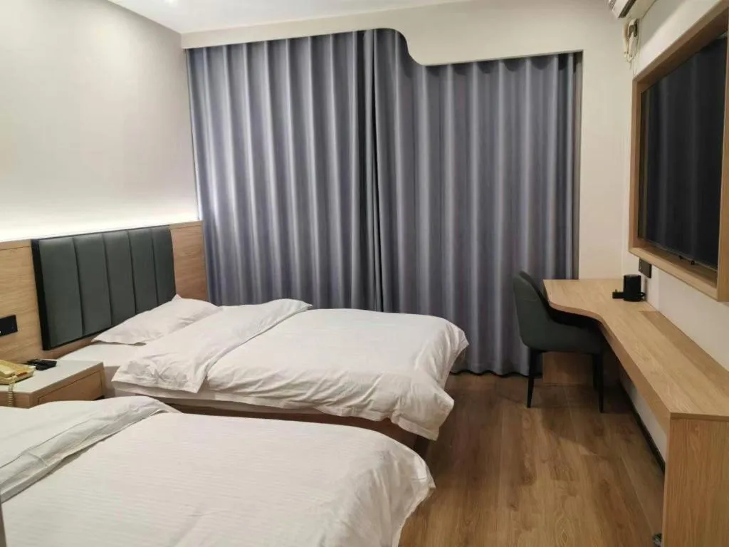 Bed in GreenTree Inn Shanghai Songjiang WanDa Plaza RonGMEi Road Express Hotel
