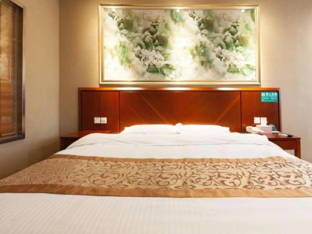 Bed in GreenTree Inn Shanghai Songjiang WanDa Plaza RonGMEi Road Express Hotel