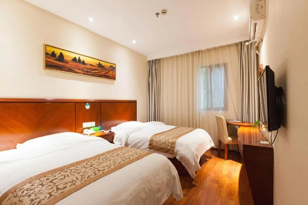 Bed in GreenTree Inn Shanghai Songjiang WanDa Plaza RonGMEi Road Express Hotel