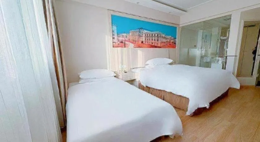 Bed in Vienna Hotel Yangzhou Yangzhou Slender West Lake Wenchangge