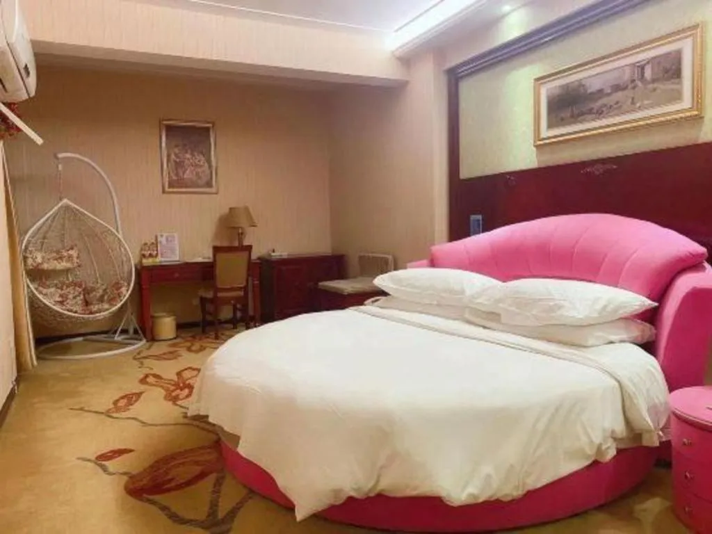 Bed in Vienna Hotel Yangzhou Yangzhou Slender West Lake Wenchangge