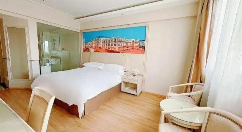 Bed in Vienna Hotel Yangzhou Yangzhou Slender West Lake Wenchangge