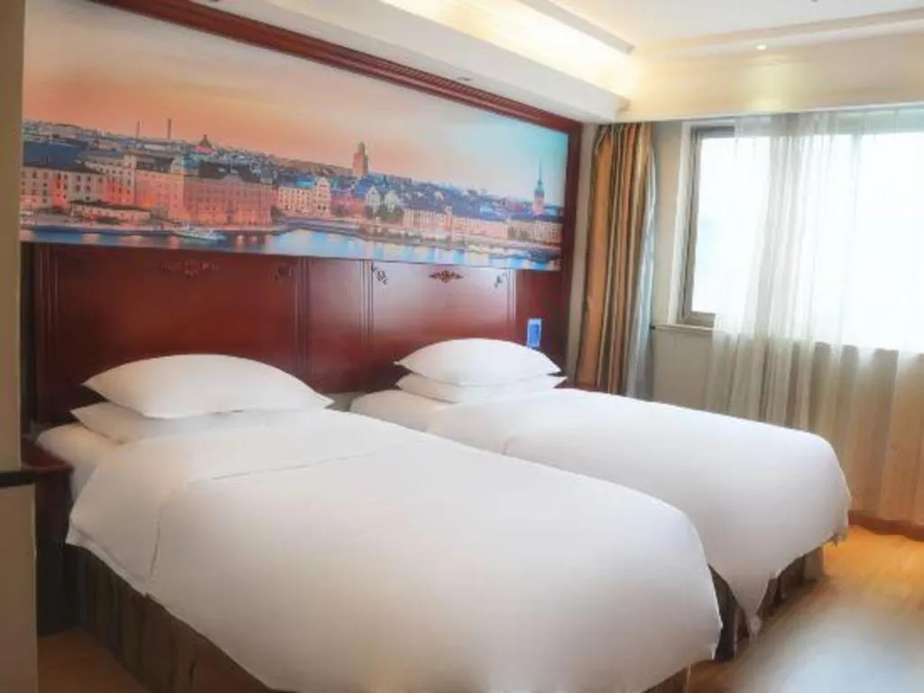 Bed in Vienna Hotel Yangzhou Yangzhou Slender West Lake Wenchangge