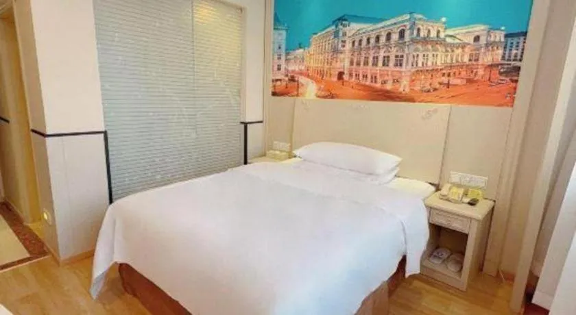 Bed in Vienna Hotel Yangzhou Yangzhou Slender West Lake Wenchangge