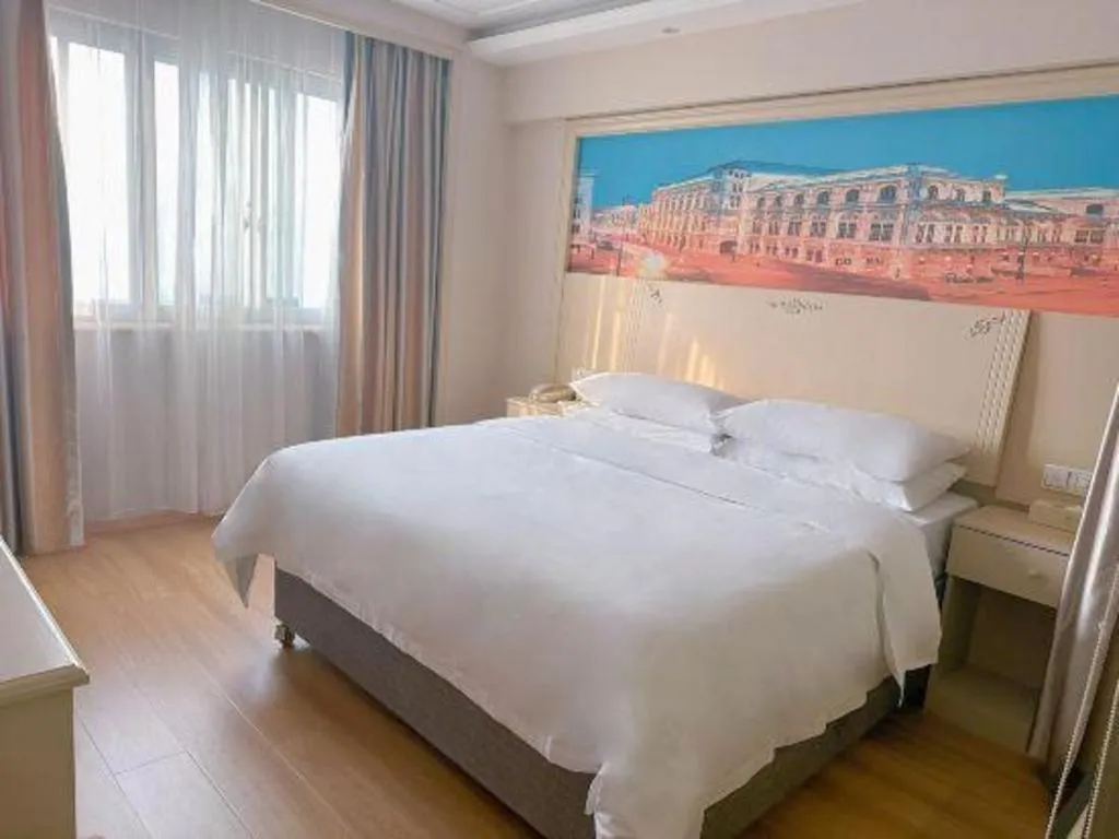 Bed in Vienna Hotel Yangzhou Yangzhou Slender West Lake Wenchangge