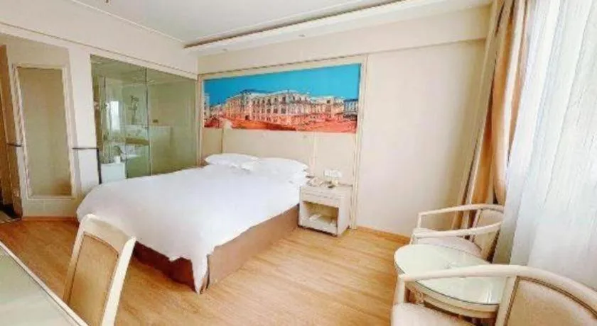 Bed in Vienna Hotel Yangzhou Yangzhou Slender West Lake Wenchangge