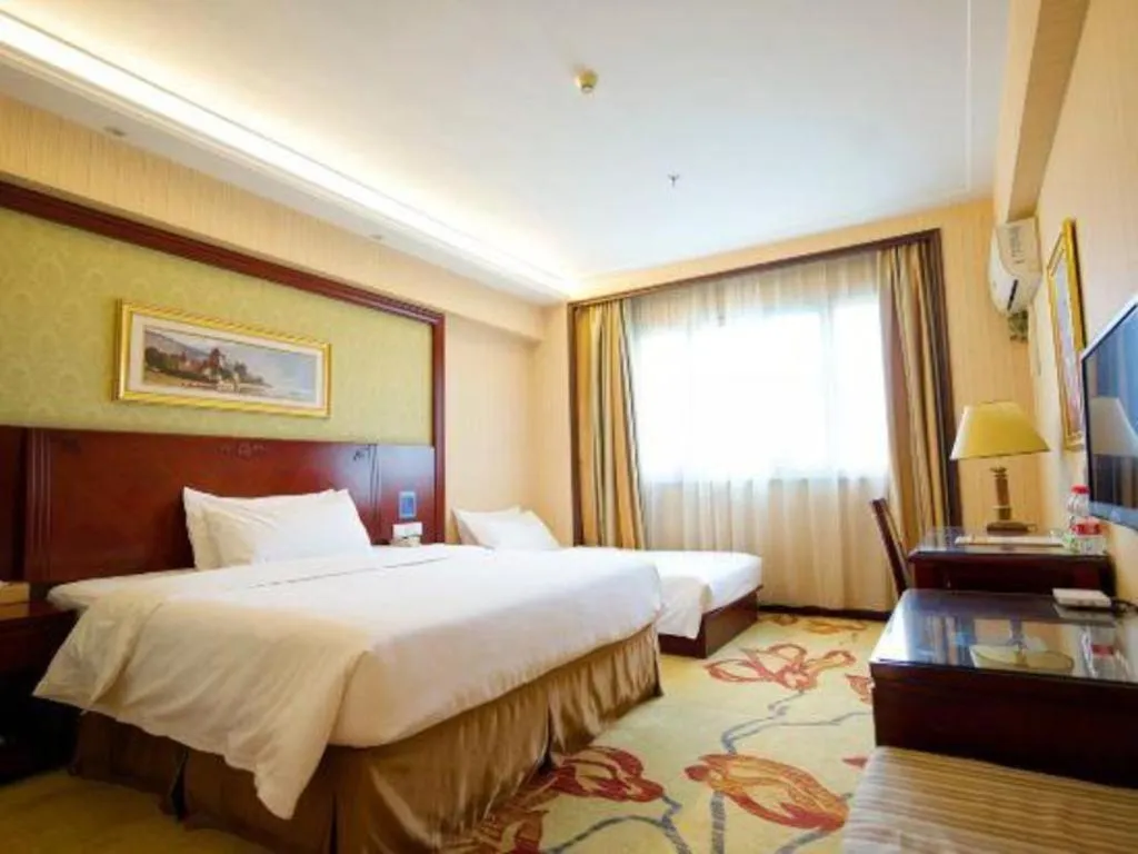 Bed in Vienna Hotel Yangzhou Yangzhou Slender West Lake Wenchangge