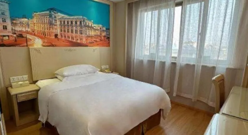 Bed in Vienna Hotel Yangzhou Yangzhou Slender West Lake Wenchangge