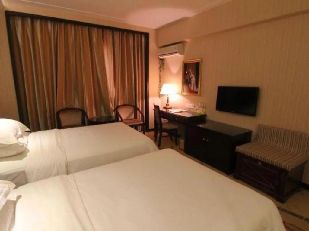 Bed in Vienna Hotel Yangzhou Yangzhou Slender West Lake Wenchangge