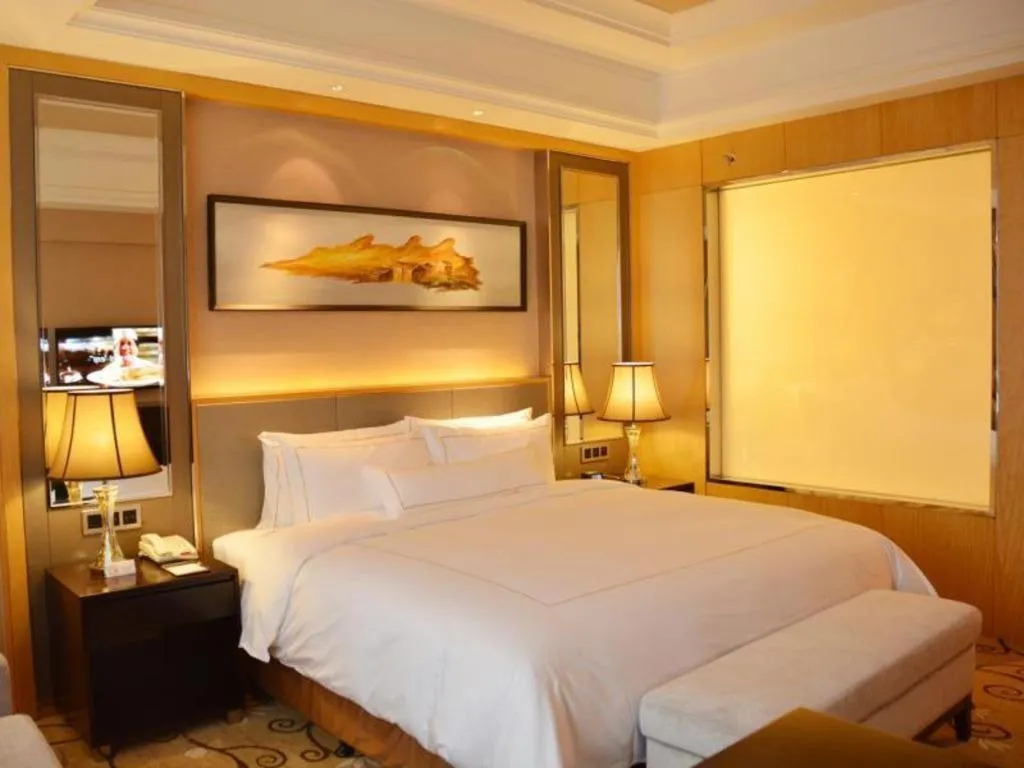 Bed in Wyndham Grand Plaza Royale Mingfa Zhangzhou