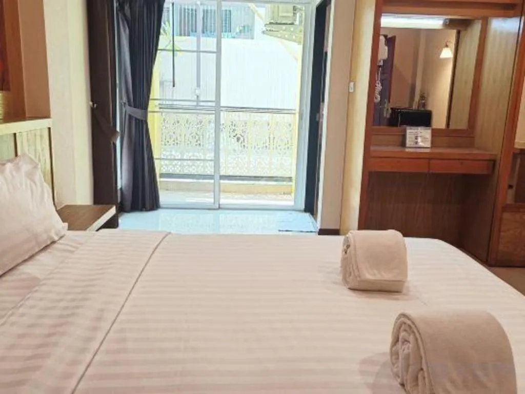 Bed in Mon Muang Hotel