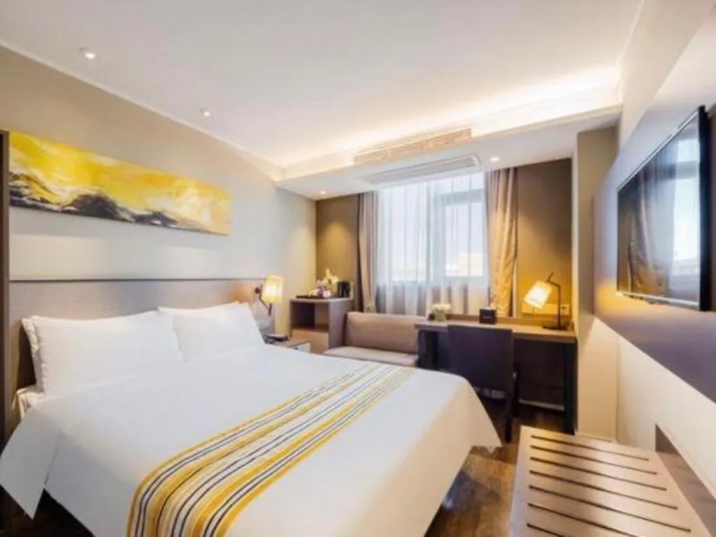 Bed in Home Inn Plus Shanghai Zhangjiang Guanglan Road Metro Station