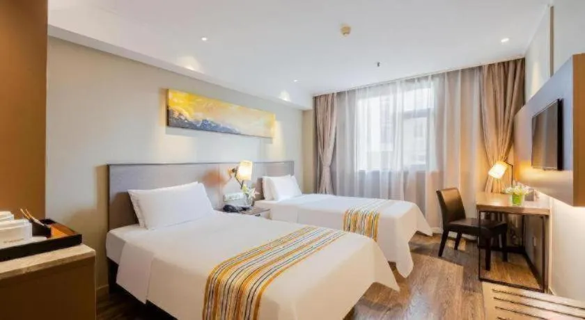 Bed in Home Inn Plus Shanghai Zhangjiang Guanglan Road Metro Station