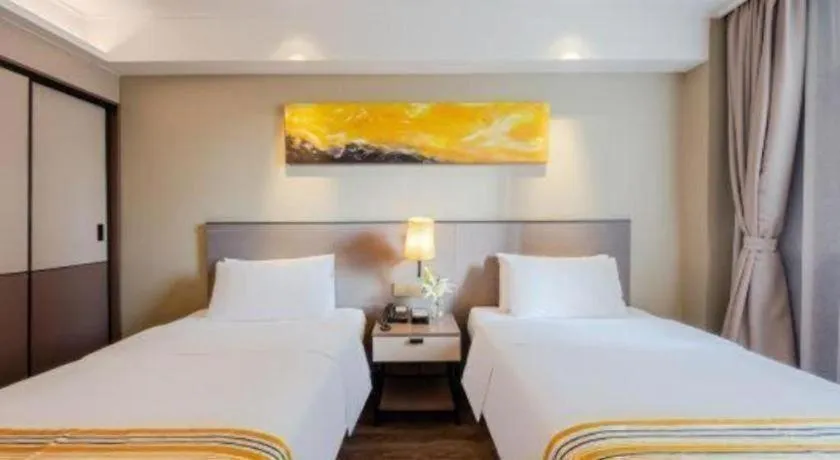 Bed in Home Inn Plus Shanghai Zhangjiang Guanglan Road Metro Station