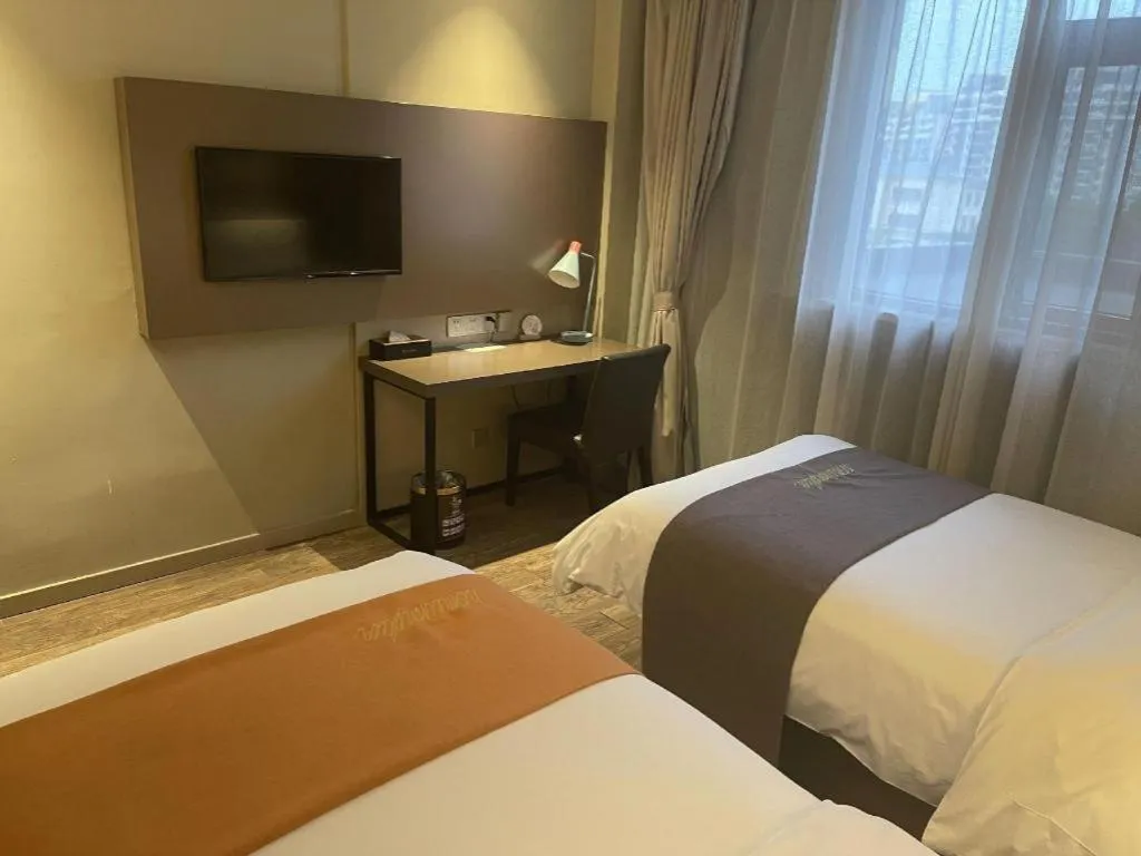 Bed in Home Inn Plus Shanghai Zhangjiang Guanglan Road Metro Station