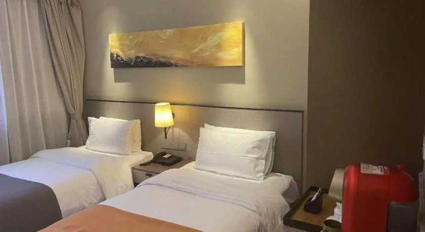 Bed in Home Inn Plus Shanghai Zhangjiang Guanglan Road Metro Station