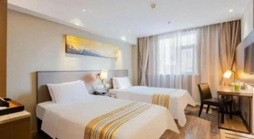 Bed in Home Inn Plus Shanghai Zhangjiang Guanglan Road Metro Station